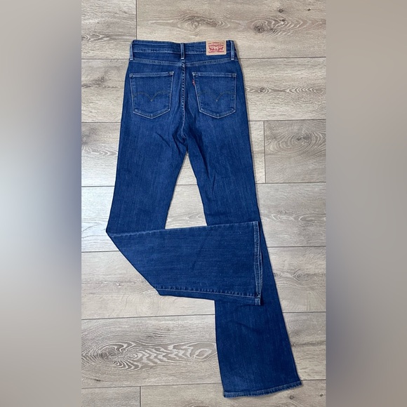 Levi’s High Rise Medium Wash Flare Jeans - Picture 12 of 16